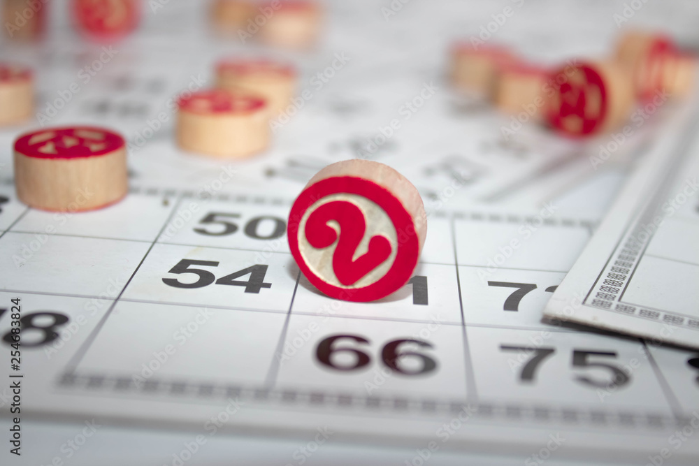 Russian lotto on a white background. Lotto game. Flat lay, top view. Russian lotto on a white background. Lotto game. Flat lay, top view.