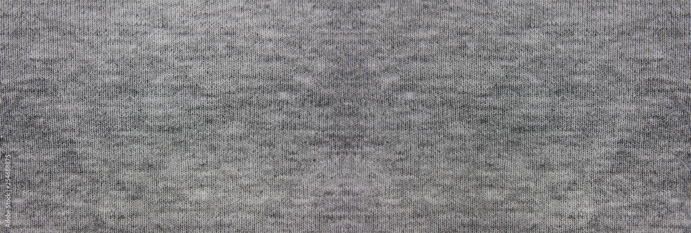Grey fabric elingated texture background. Casual gray cloth wide image with blank copy space for text Grey fabric elingated texture background. Casual gray cloth wide image with blank copy space for text