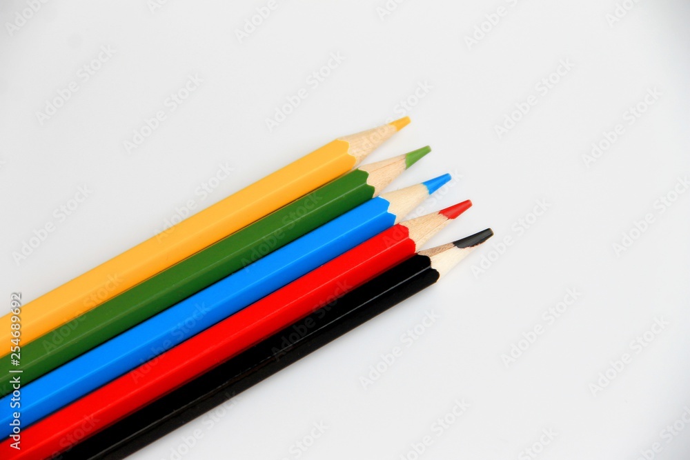 color pencils on white background side view. color pencils on white background side view.