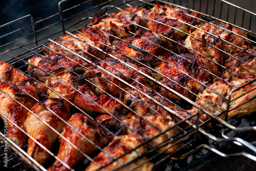 Grilled chicken leg snack for outdoor party.