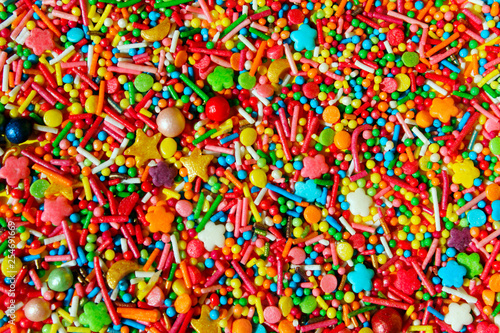 Abstract Colorful Background. Colorful Candies Background With A Lot Of Copy Space For Text. Many Multicolored Candy Sweets. Closeup Of Multicolored Small Candies.