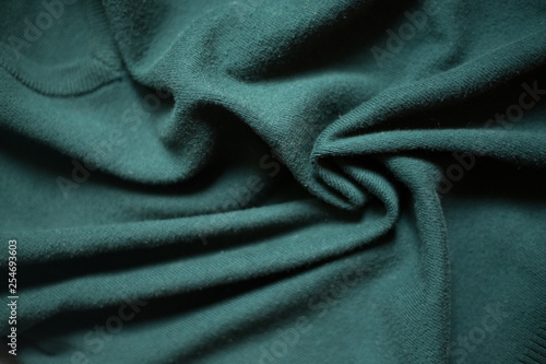 Background texture pattern wrinkled Green fabric. Greenery tone