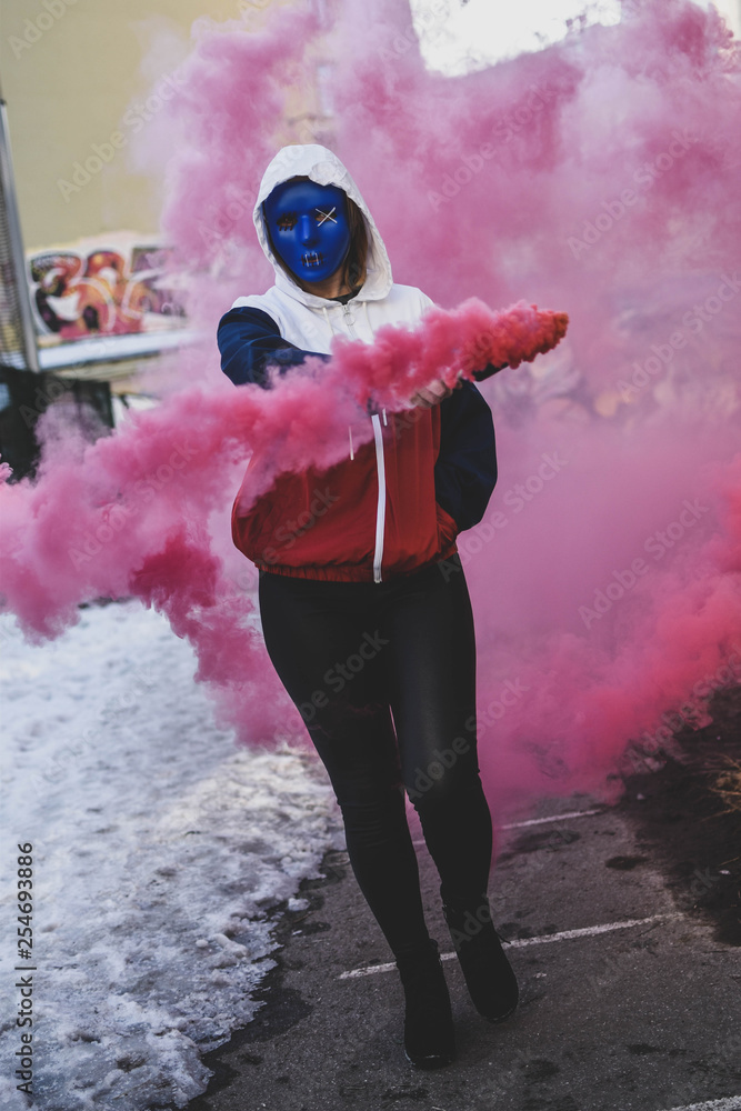 young woman in mask