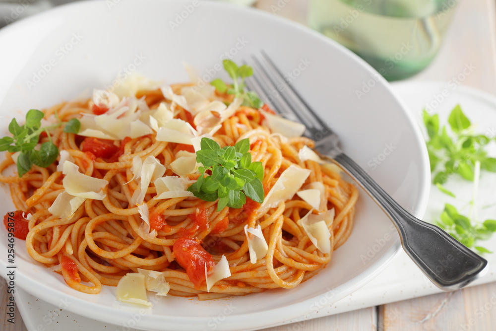 Spaghetti with tomato sauce, parmesan  and basil