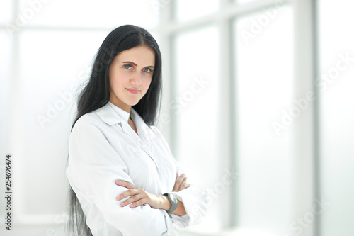 Free Download female therapist standing by the hospital window - GFXLoad