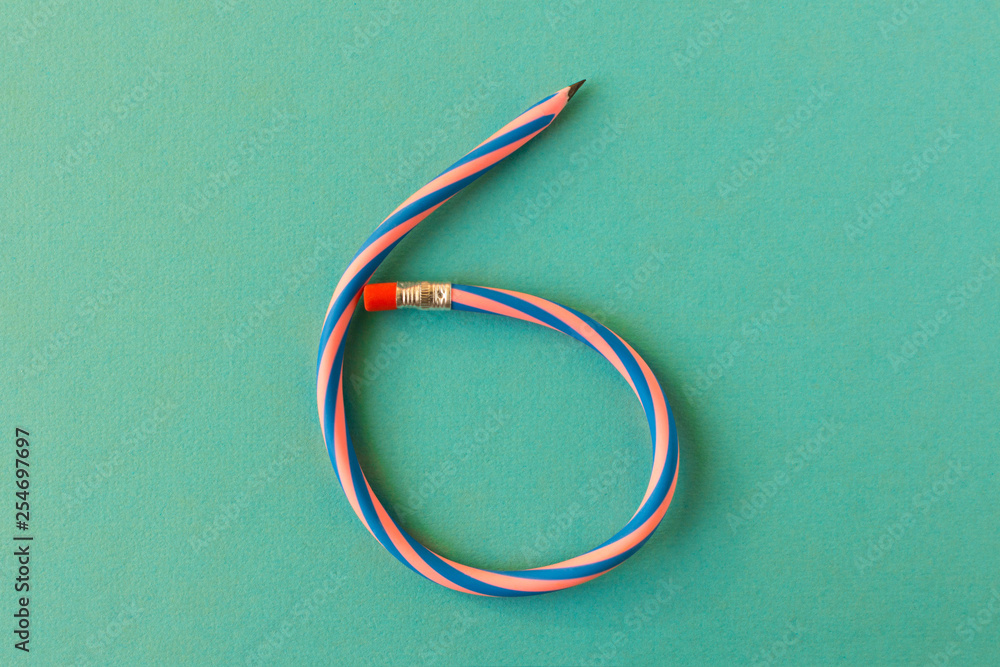 Flexible pencil . Isolated on light background. Bending pencil. Flexible pencil . Isolated on light background. Bending pencil.