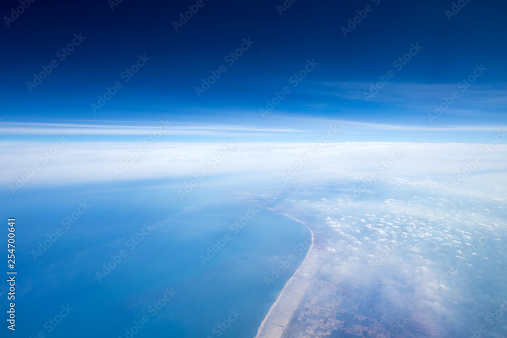 Fototapeta premium Clouds, a view from airplane window