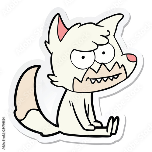 sticker of a cartoon grinning fox