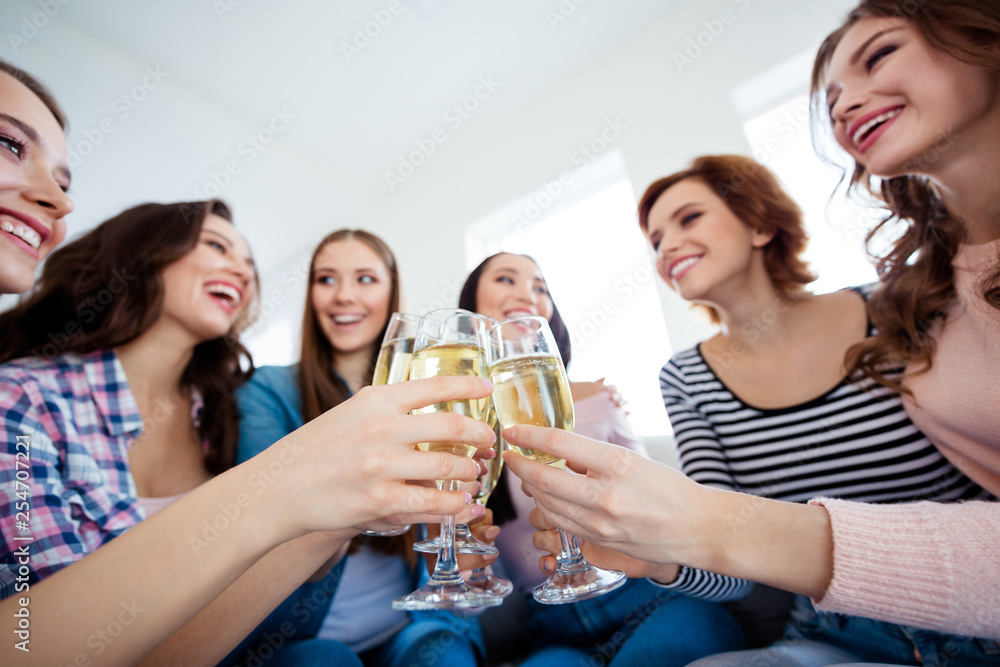 Cropped close-up low below angle view of nice lovely charming attractive cheerful ladies tasting wine wineglass great event greetings congrats wedding in light white interior room indoors Cropped close-up low below angle view of nice lovely charming attractive cheerful ladies tasting wine wineglass great event greetings congrats wedding in light white interior room indoors