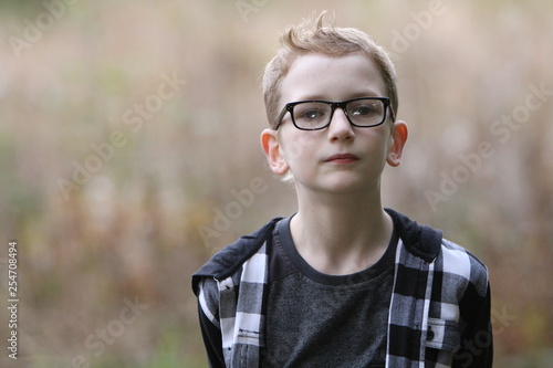 portrait of young man in glasses