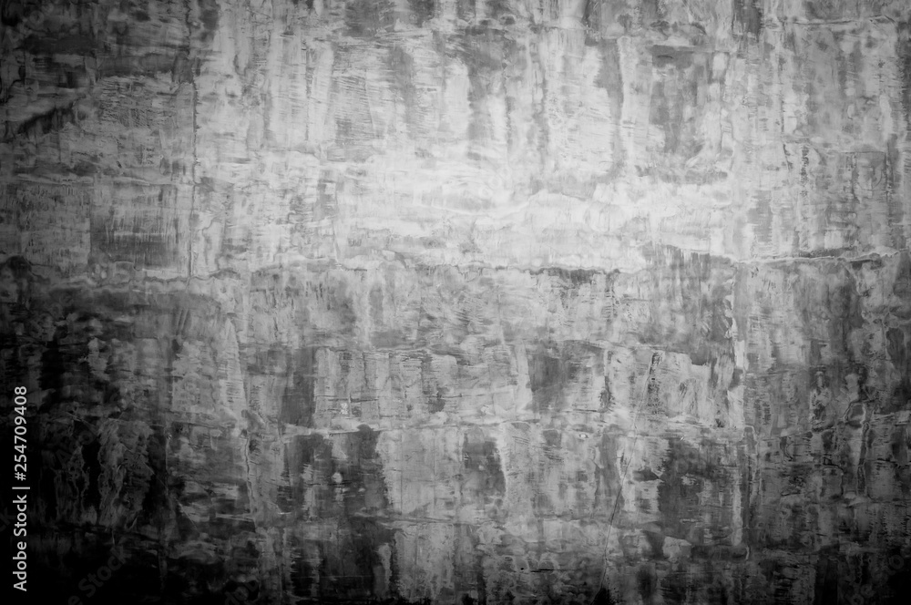 Obraz premium Wall panel grunge black or dark grey concrete background.Backdrop Dirty,dust black wall concrete,cement blackboard texture and splash brush stroke for architecture or abstract background.