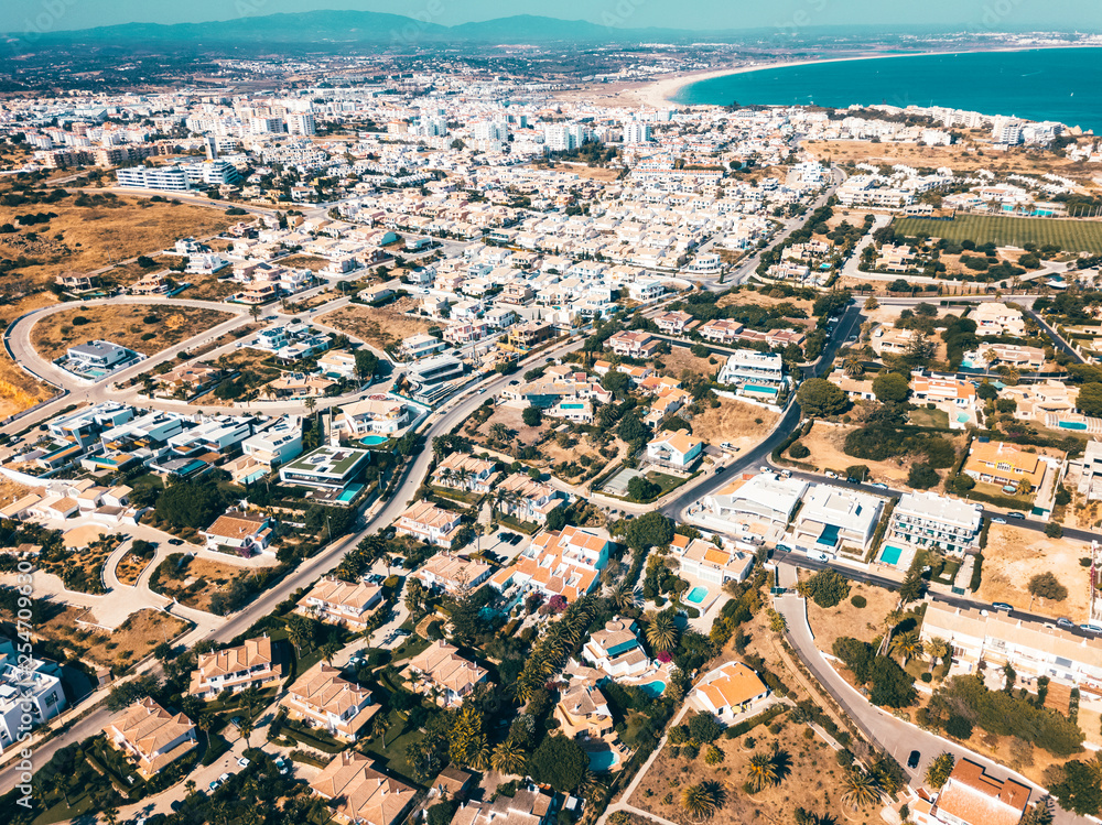 Aerial Drone View Of Lagos Residential Neighborhood And Houses In Portugal
