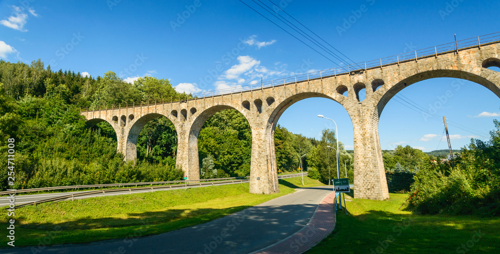 Old railway viaduct in the mountains above the road, Lewin Klodzki.