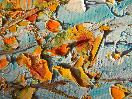 Close up view of colorful brush strokes on linen canvas