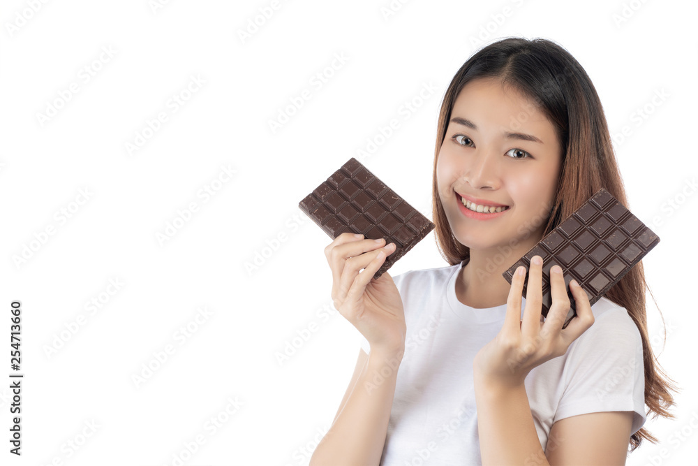 Beautiful woman with a happy smile holding a hand chocolate isolated on a white background. Beautiful woman with a happy smile holding a hand chocolate isolated on a white background.