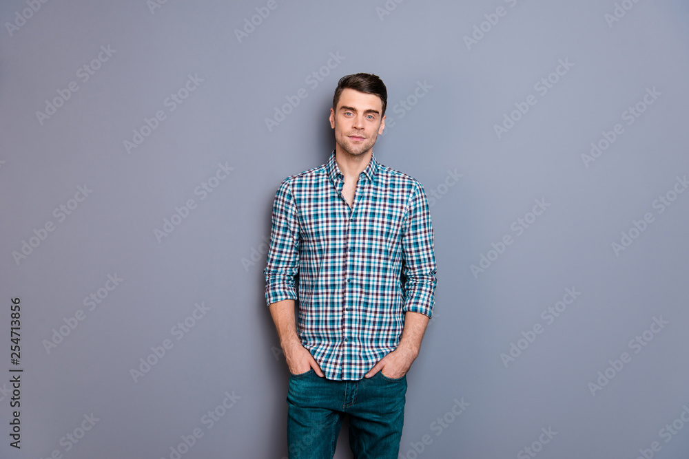 Close up photo attractive amazing he him his man arms hands in pockets ideal perfect hairdo styling easy-going wearing casual plaid checkered shirt jeans denim outfit isolated grey background