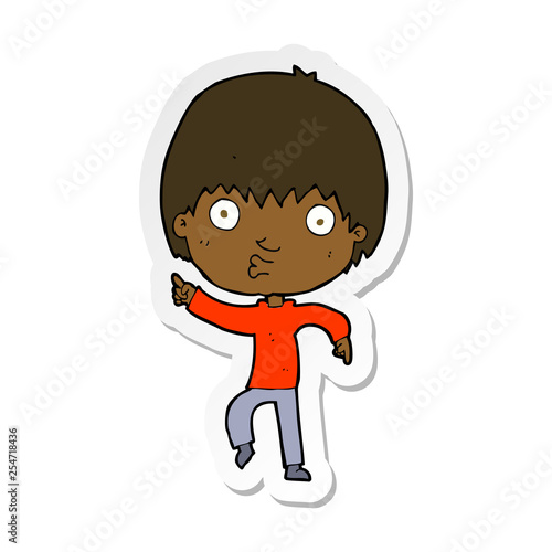 sticker of a cartoon impressed boy pointing