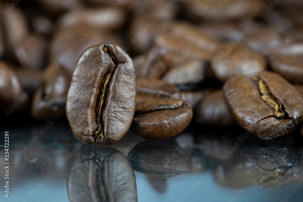Aromatic coffee beans on black