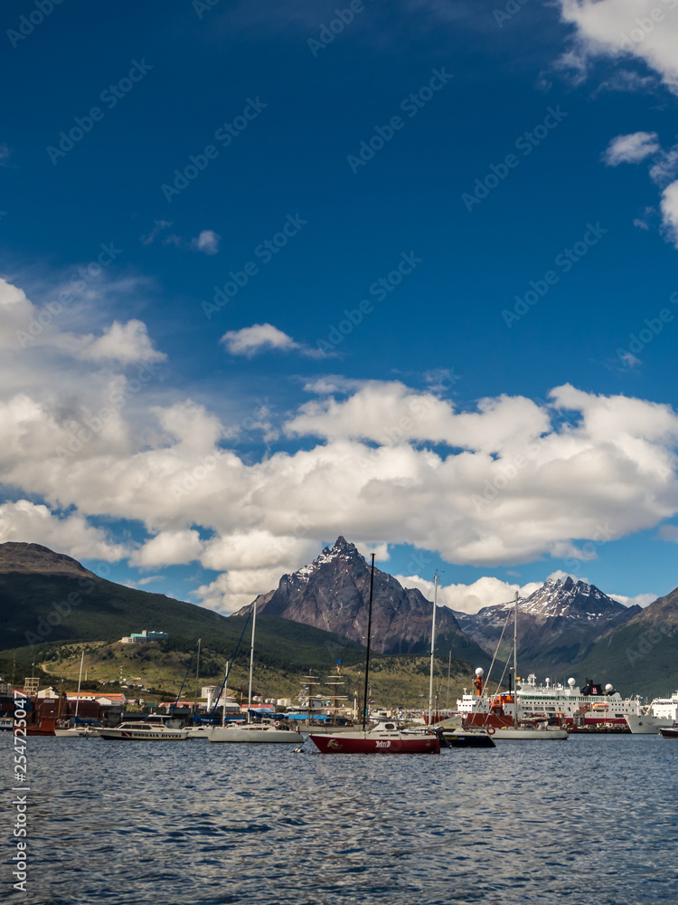 Ushuaia from the sea with ships and mountains, Patagonia in Argentina. Mount Oliva in the back