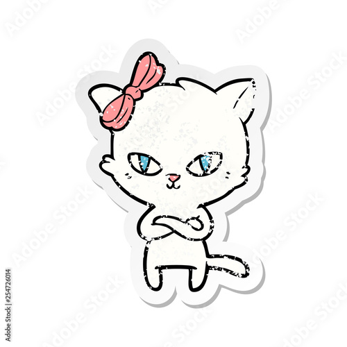 distressed sticker of a cute cartoon cat