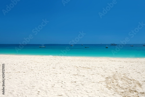 Wonderful white sandy beach on paradise Zanzibar island