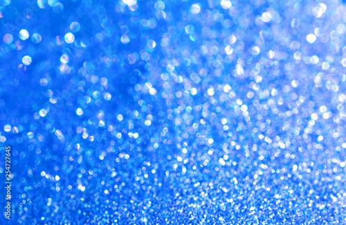 Blue glitter texture christmas abstract background. Shiny wrapping paper texture, greeting card design element.