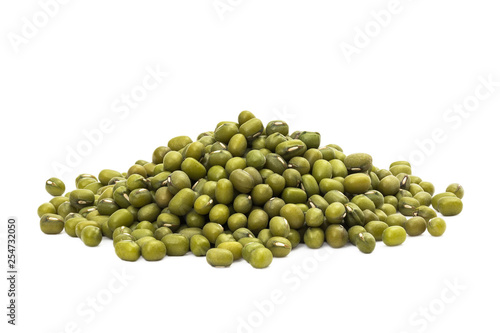 Pile of green mung beans seen from the side and isolated on white background photo