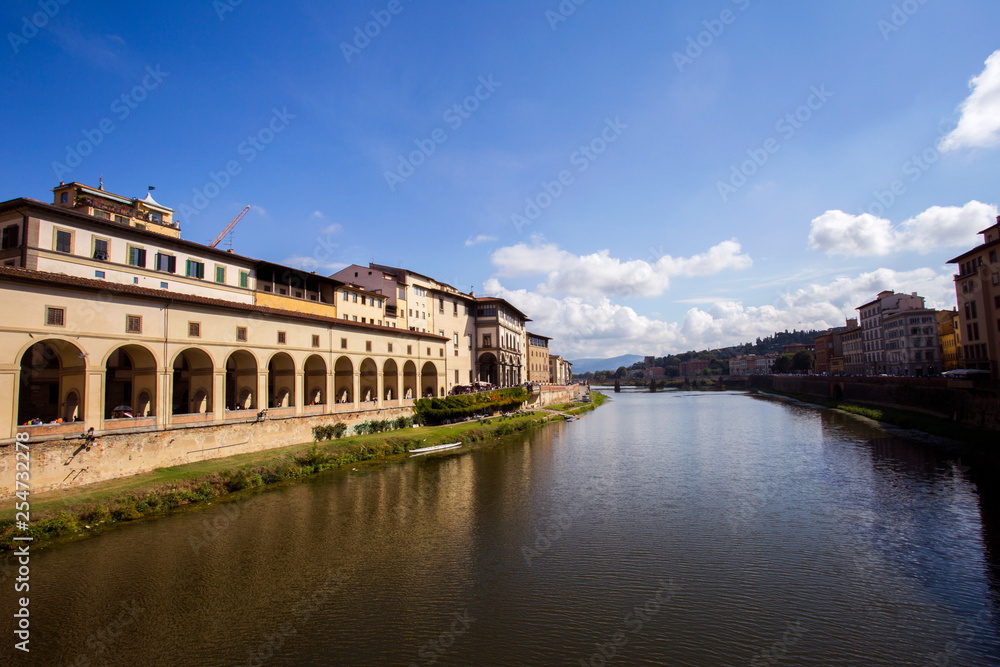 View from Ponte Vecchio bridge over Arno river in Florence, Italy. 