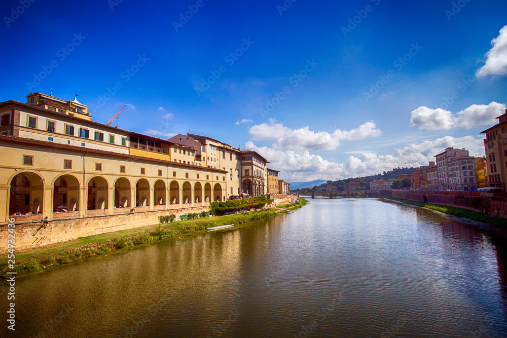 View from Ponte Vecchio bridge over Arno river in Florence, Italy. 