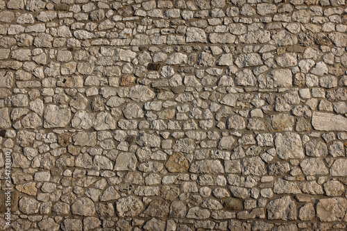 abstract background old gray stone wall closeup