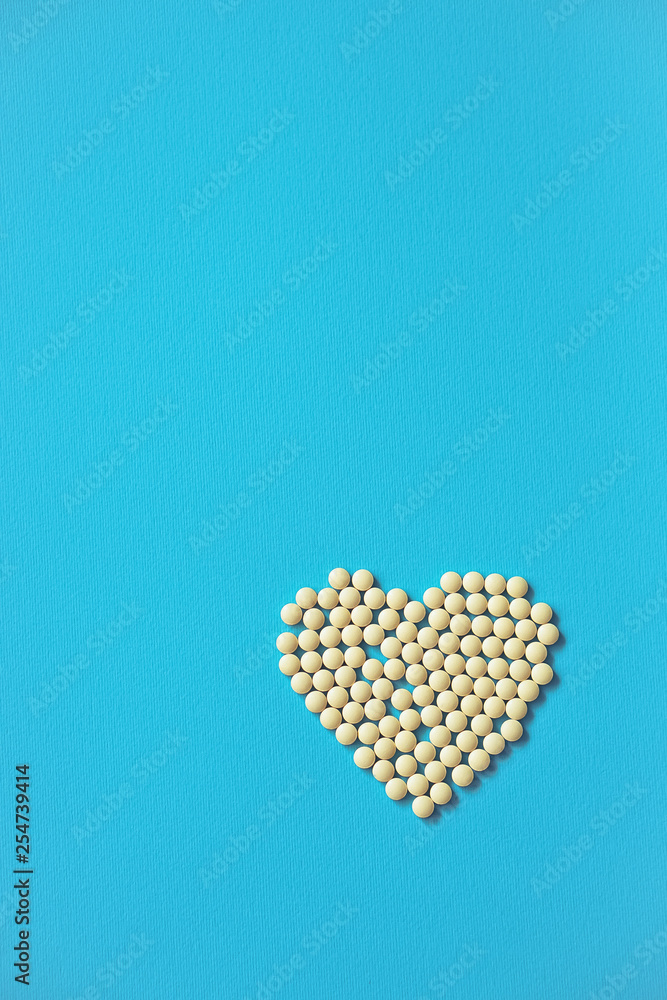 Assorted pharmaceutical medicine pills, tablets and capsules and bottle on purple background. Drugs and various narcotic substances. Copy space for text. Stock photo for design Assorted pharmaceutical medicine pills, tablets and capsules and bottle on purple background. Drugs and various narcotic substances. Copy space for text. Stock photo for design