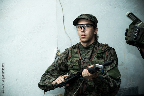 airsoft player on the game of war photo