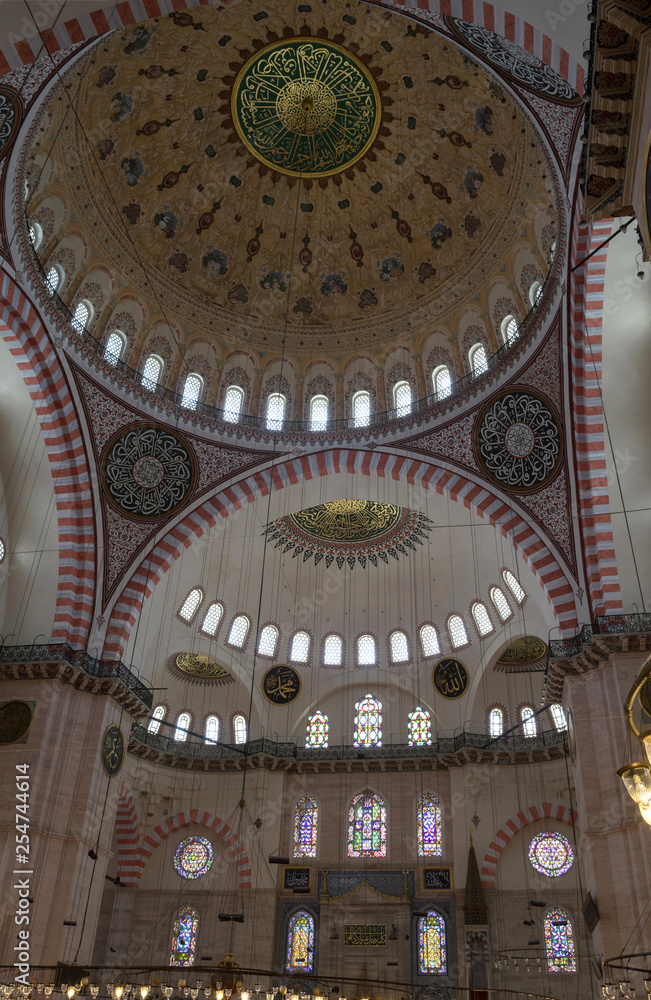 fragment of the interior of the Suleymaniye mosque with the main dome, the largest mosque in Istanbul.
