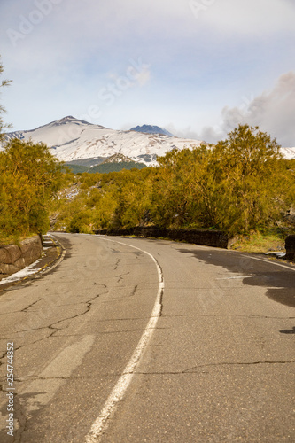 Road to volcano and snow covered Etna Mount, Sicily, Italy