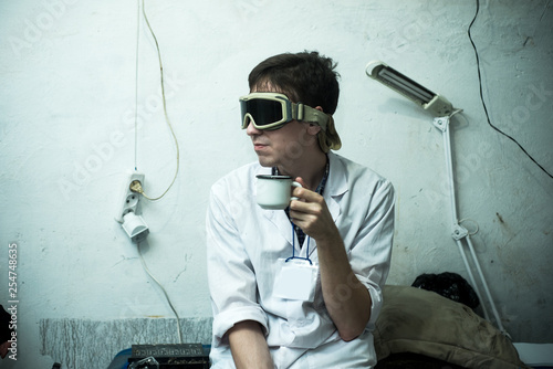 a scientist in a bunker in post-apocalypse photo