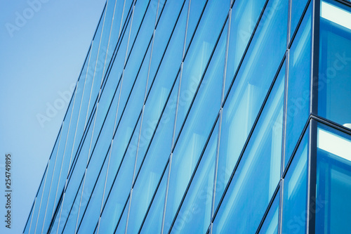 Blue skyscraper out of glass, modern office building