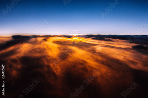 Beautiful sunset above the clouds
