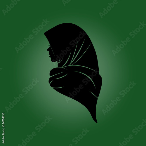 silhouette of a woman in hijab