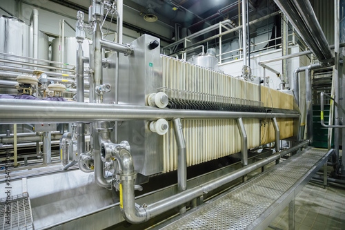 Tableau sur toile Filtration machinery in modern brewery production line