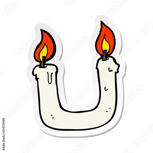 sticker of a burning the candle at both ends cartoon