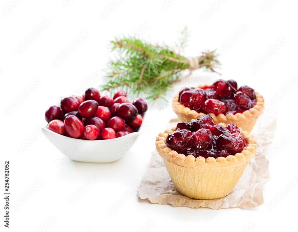 egg custard tarts with cranberry jam isolated on white egg custard tarts with cranberry jam isolated on white