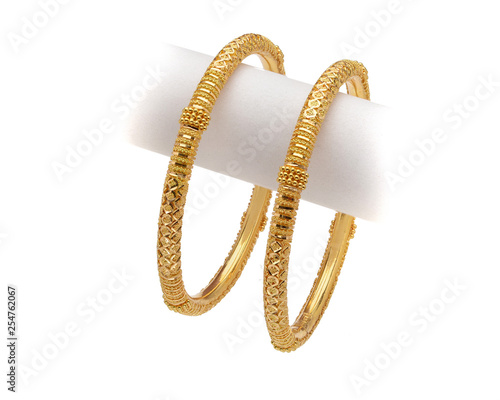 22k gold bangle on white background photo