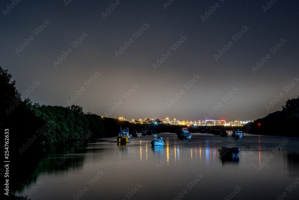river with distant city lights river with distant city lights
