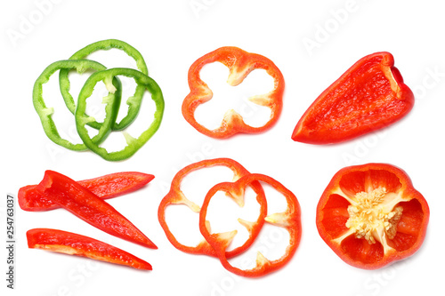 Wallpaper Mural cut slices of red and green sweet bell pepper isolated on white background top view Torontodigital.ca