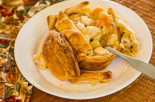 Homemade turkey pot pie in flaky; golden brown pastry.