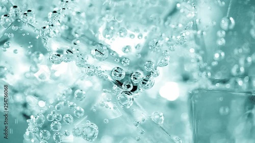 turquoise water, ice and water bubbles background.