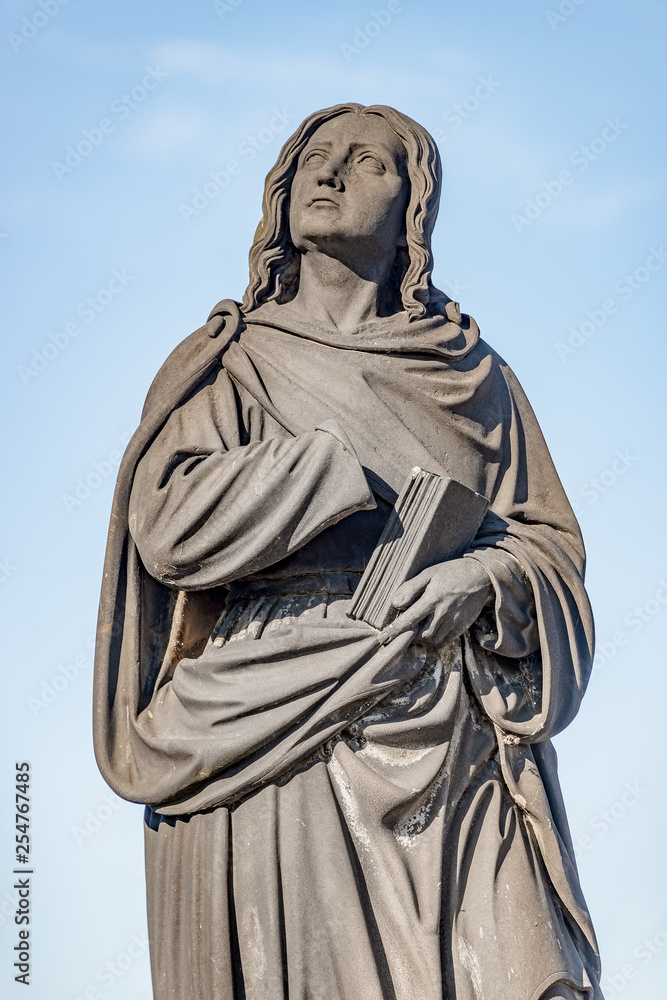 Statue of nun at the Charles Bridge in Prague, Czech Republic