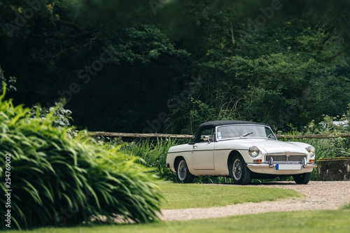 Oldschool and vintage GM car in a french country landscape