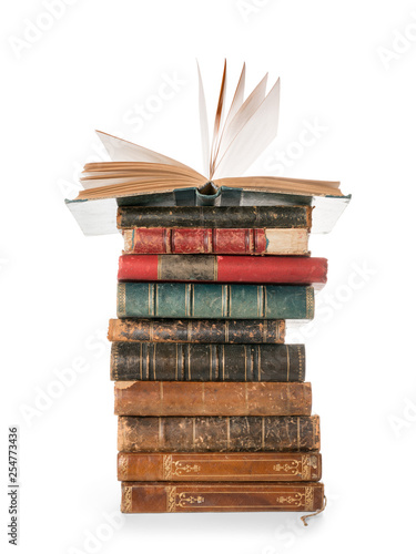 Large books pile with singl...