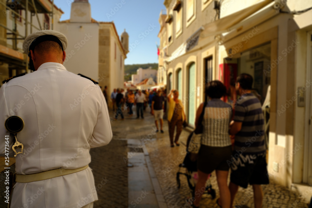A military musician going to the parade in Sesimbra, Portugal.